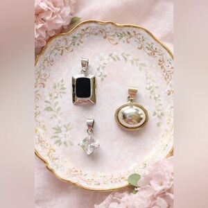 Three Sterling Silver Pendants
